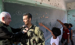 İsrail askerleri bombaladıkları okulda kutlama yaptı!
