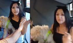 Köpeği ile otobüse binen genç kadın tepki gösteren yolcularla tartıştı