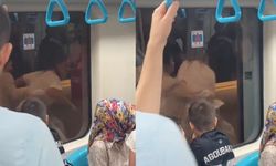 VİDEO I Marmaray'da saç saça baş başa kavga