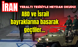 İran yeraltı tesisiyle meydan okudu! ABD ve İsrail bayraklarına basarak geçtiler...