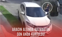 Aracın altında kalmaktan son anda kurtuldu!