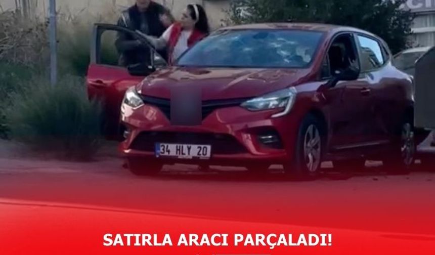 Satırla aracı parçaladı!