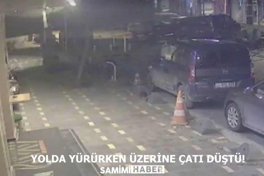 Yolda yürürken üzerine çatı düştü!